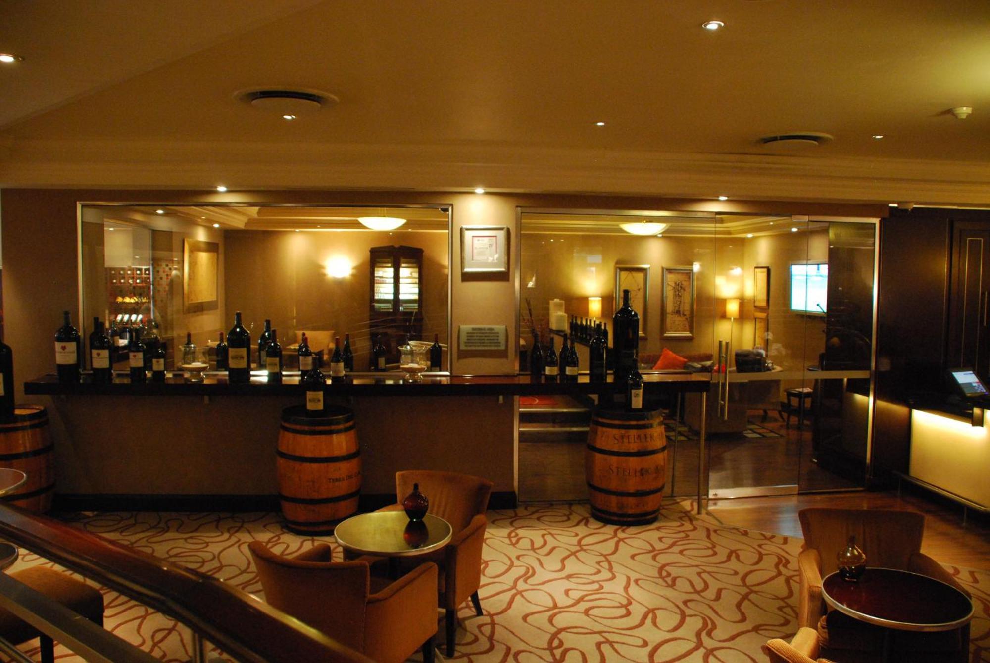 Southern Sun Or Tambo International Airport Kempton Park Bagian luar foto Wine cellar in a wine bar